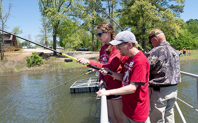 Henderson hosts fishing derby for AHDC clients